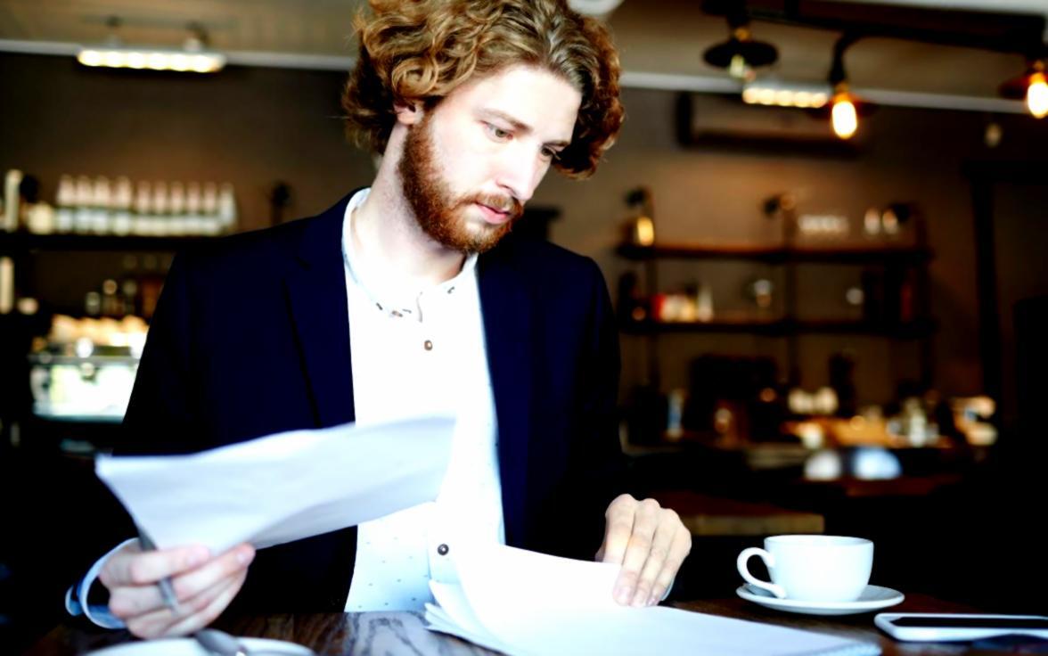 Trading automation workspace with multiple monitors displaying market data